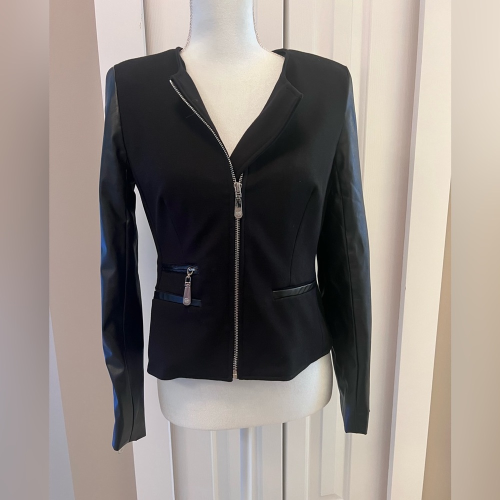 Vince Caputo jacket.